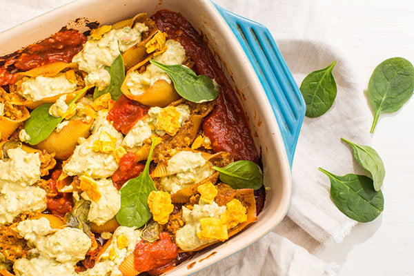 Rawcology Inc | Spinach and Cauliflower Cream Stuffed Pasta Shells