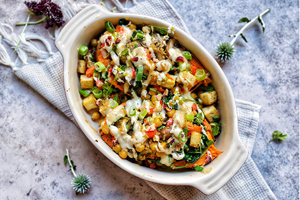 Rawcology Inc | Stuffed Sweet Potatoes with Tahini Sauce
