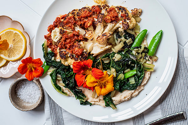 Cauliflower Steaks with White Bean Hummus and Red Pepper Tapenade